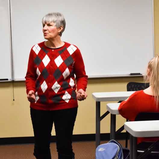 Mary Flynn teaches class
